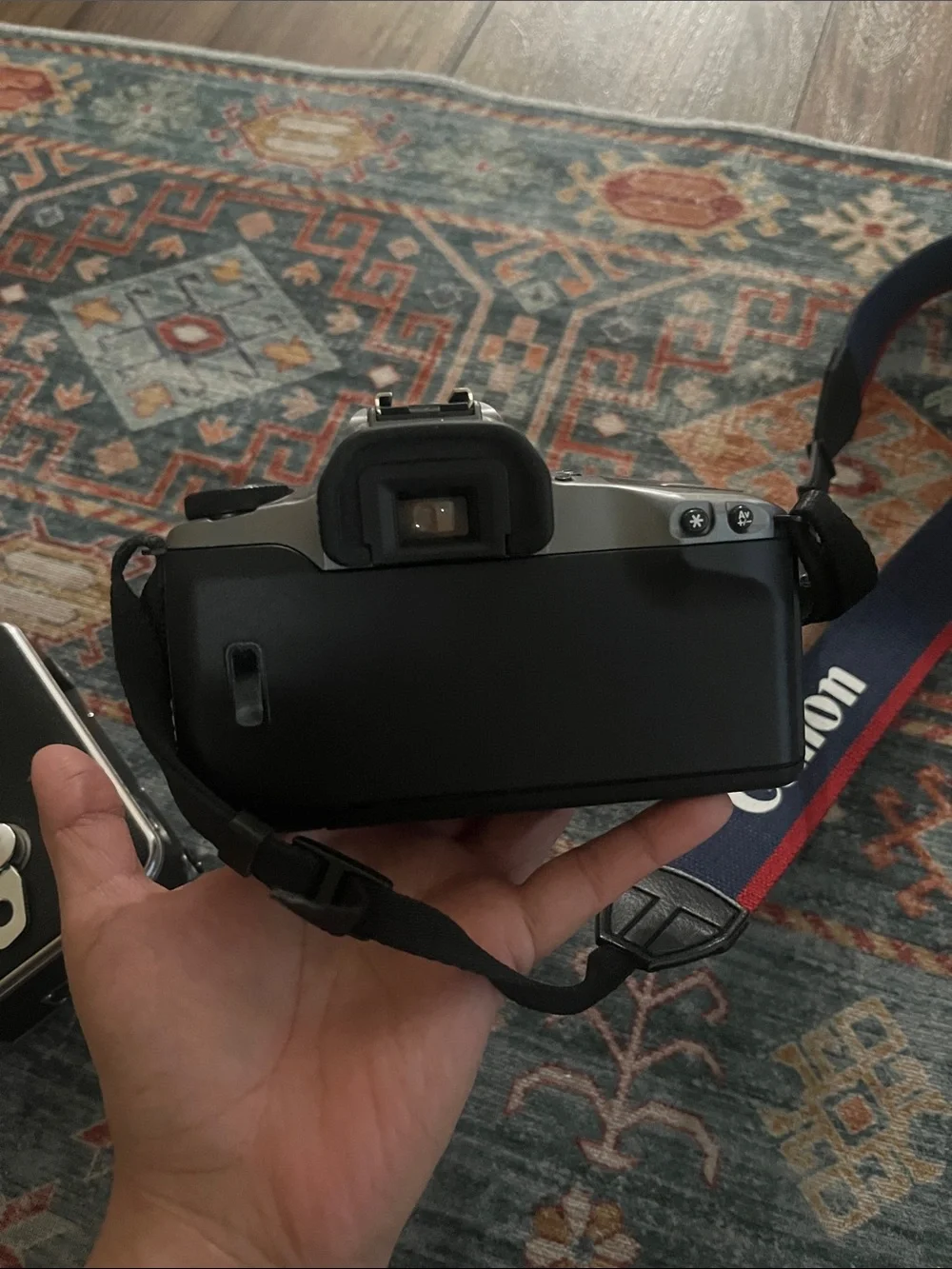 Not Tested/ Canon EOS Rebel Gii Camera in Black and Silver with Black Lens Cap